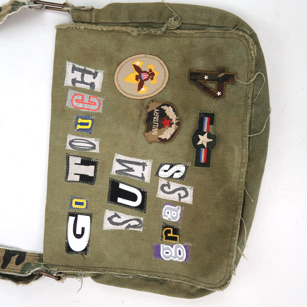 1OF1 "GO TOUCH SUM GRASS" ARMY BAG